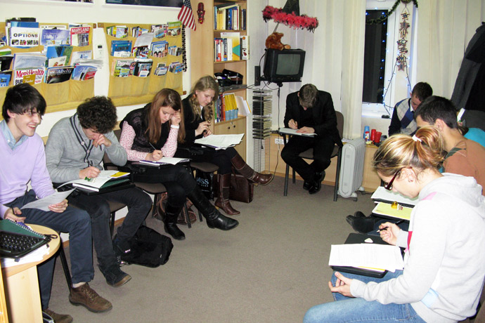 Filling out course evaluation forms at Terra Nova. TOEFL Preparation / Section 3 (Tu.Th. Afternoon Group). December 2011.
