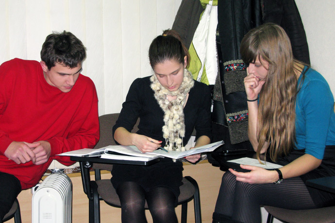 Debating (the Karl Popper debate format) at Terra Nova. From left to right: Sergiu Chiriac, Victoria Cunețchi, Natalia. TOEFL Preparation / Section 4 (Tu.Th. Evening Group). December 2011.